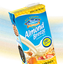 Almond breeze hint of honey almond milk carton
